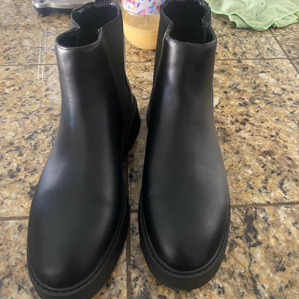 New black ankle boots